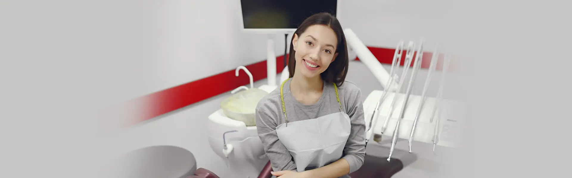 Dentist reviewing X-ray on monitor